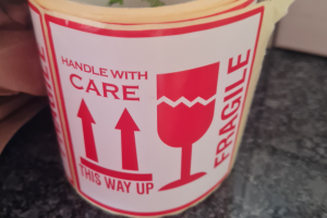 Image of handle with care label